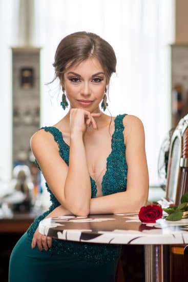 Happy couple using GR8Date dating app on smartphone